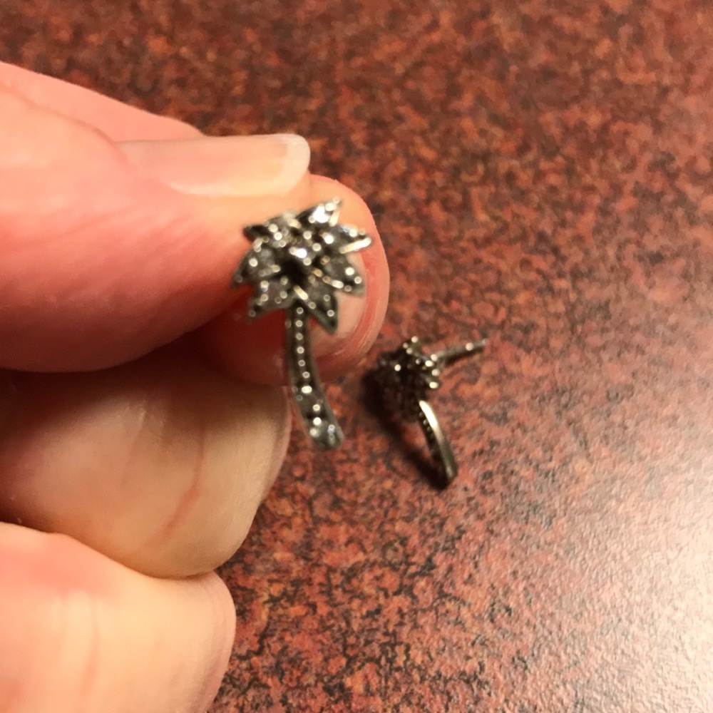 Silver palm tree stud earrings with clear stones